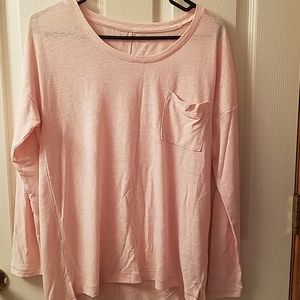 Long pink sweater with long sleeves.